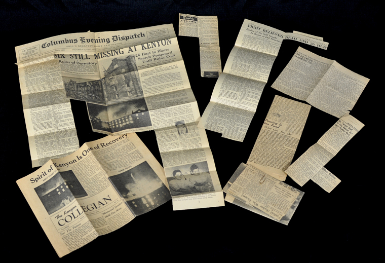 Old newspapers and pictures being restored using AI photo restoration tool.