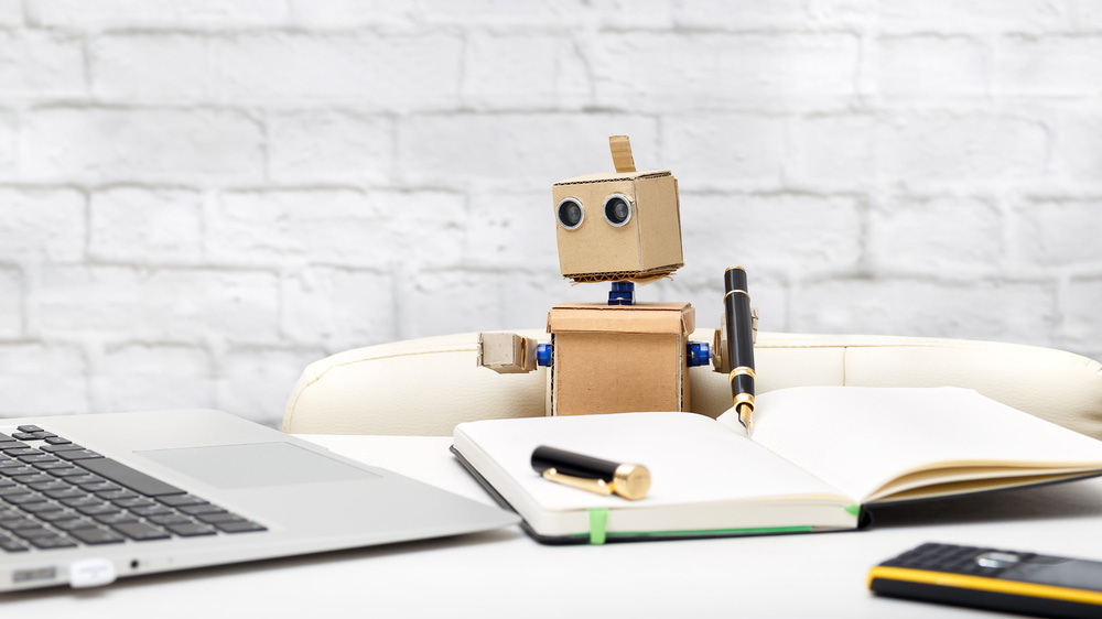 A robot utilizing Grammar AI to do writing tasks