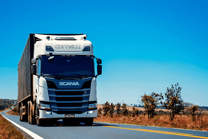 truck driving on a road, highlighting AI advantage and artificial intelligence in transportation